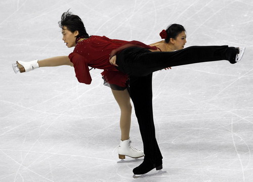 Pang/Tong win gold at World Figure Skating Championships