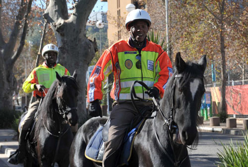 South African police patrol for stadium security