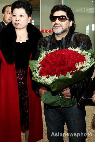 Maradona arrives at Beijing for charity tour