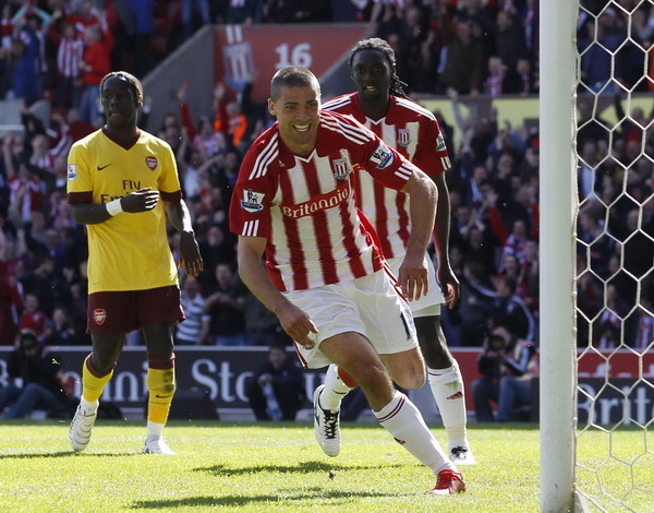 Arsenal's title hopes end with 3-1 loss at Stoke