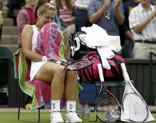 Li Na shocked by wildcard Lisicki at Wimbledon