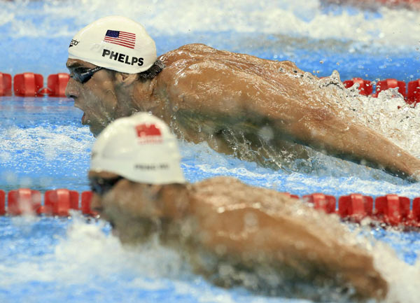 Phelps goes for 1st individual gold at worlds