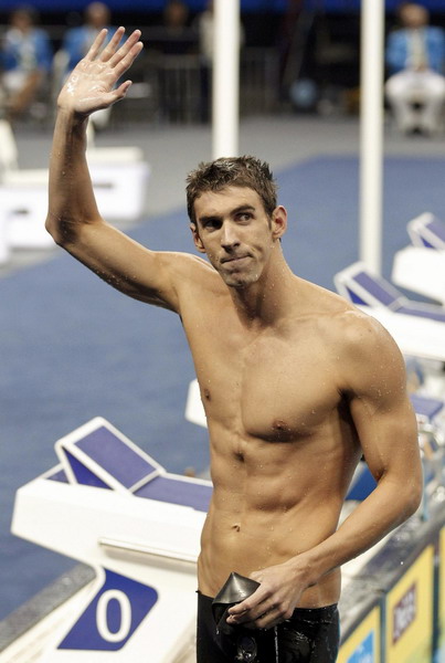 Phelps takes 3rd gold at swim worlds in 100 fly