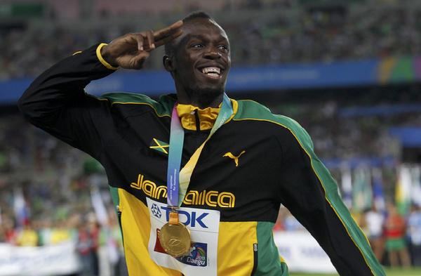 Proud Bolt fires Jamaican team to world record