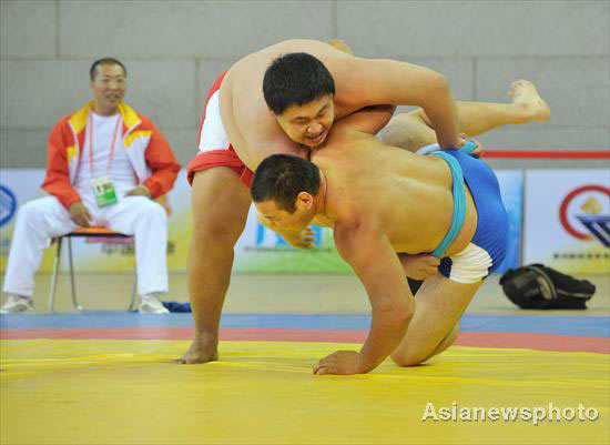 Ethnic style wrestling amazes wrestlers from Taiwan