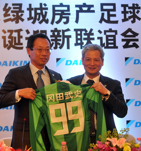 New Hangzhou coach Okada aims to beat Barca