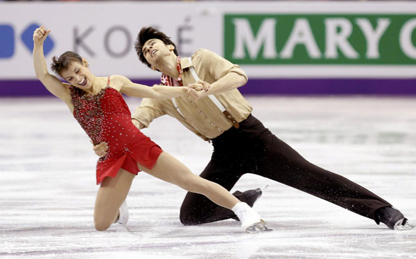 Russian duo top German rivals in short program