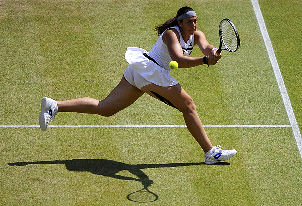 Bartoli sinks tearful Lisicki to win Wimbledon