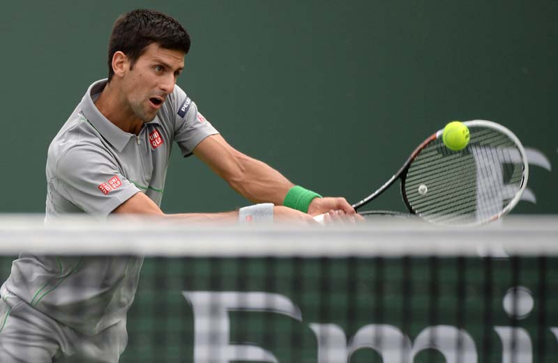 Li Na, Djokovic advance at Indian Wells