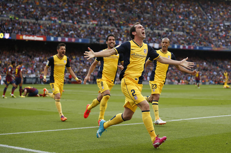 Atletico wins Spanish title with 1-1 draw at Barca