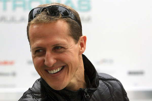 Schumacher out of coma, shifted to Swiss hospital