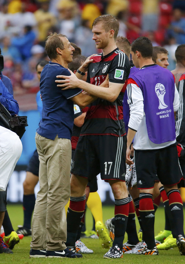 Klinsmann, Loew nurse US, Germany to KO stage