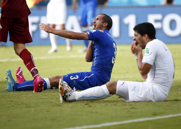 FIFA bans Suarez for 4 months for biting opponent