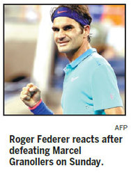 Firing Federer finds his mojo after rain break