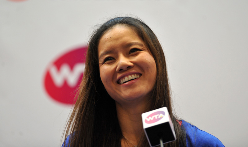 Li Na waves good-bye to hometown fans