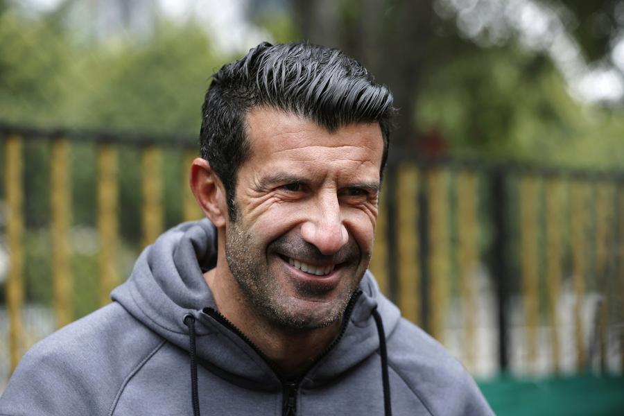 Figo charms soccer fans in Guangzhou