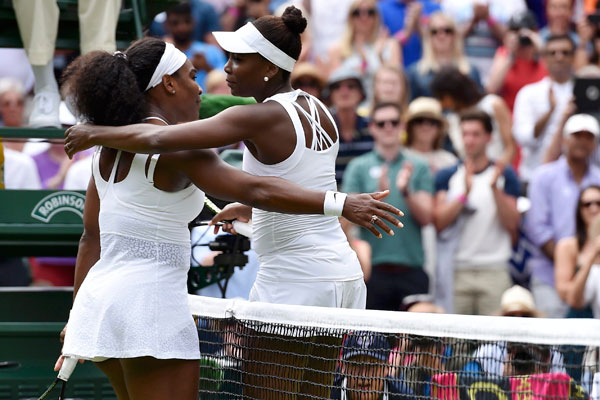 Serena Williams beats sister Venus to reach last eight