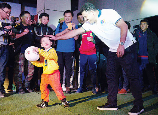 Brazil's Ronaldo sets the ball rolling for China academies