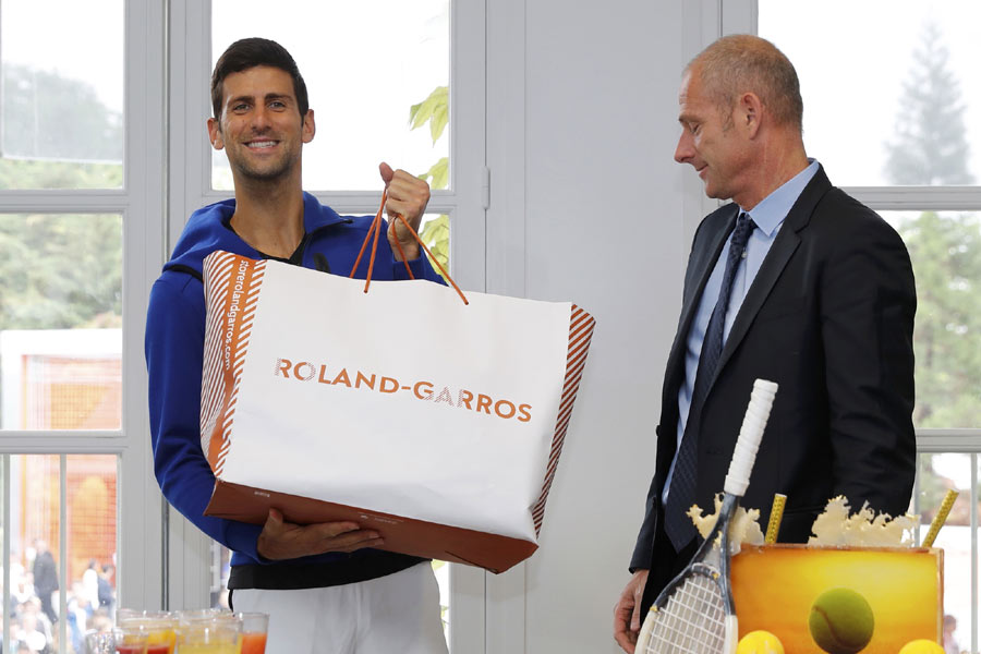 Djokovic marks his birthday at Roland Garros