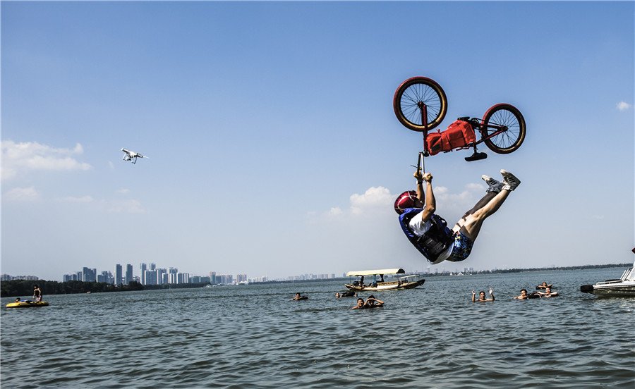 Perfect shot in Wuhan: BMX riders in the air