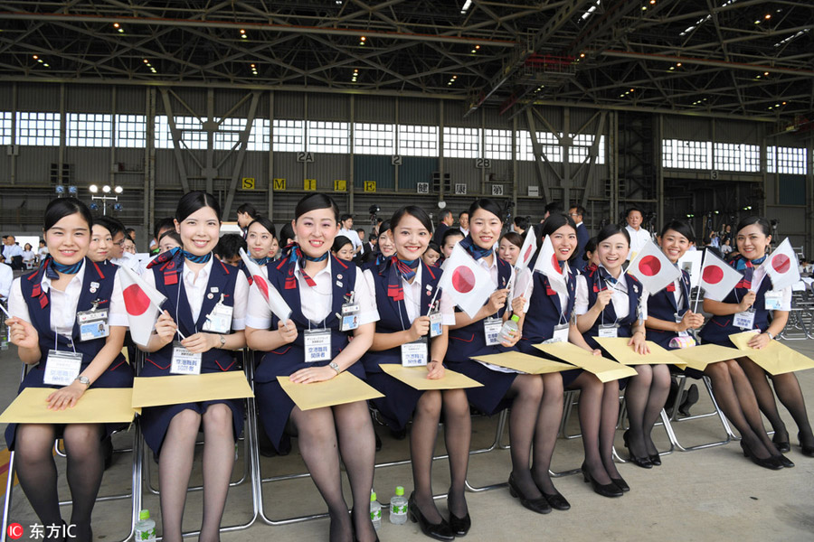 Tokyo welcomes the Olympic flag