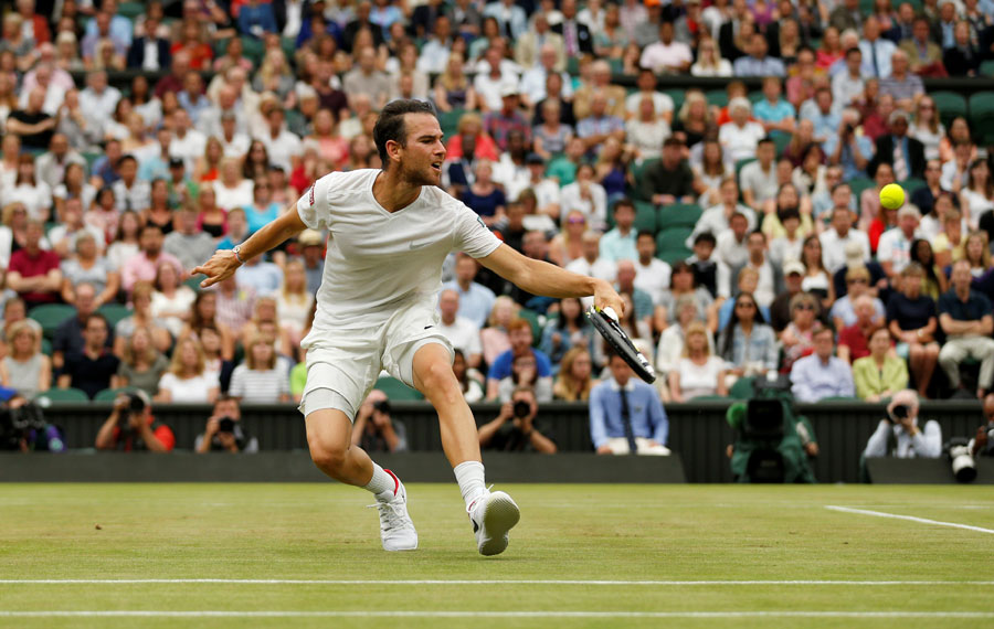 Djokovic hits out over delay after booking place in quarters