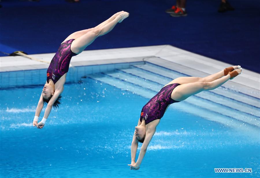 Chinese divers add two synchronized gold medals at the worlds