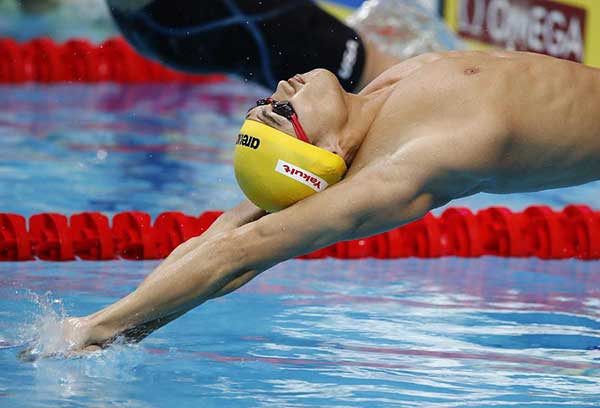 Tough overseas training pays off for golden swimmers