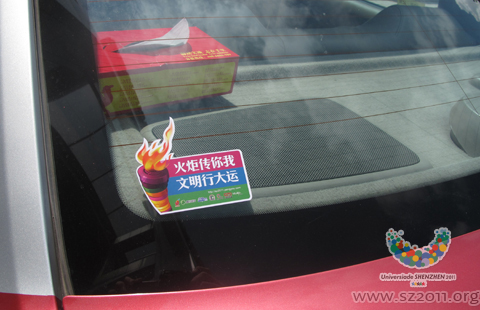 Torch logo stickers distributed