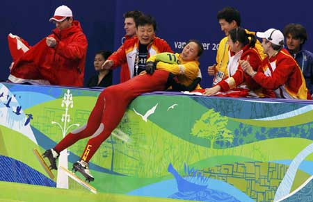 Wang Meng defends 500m short track gold