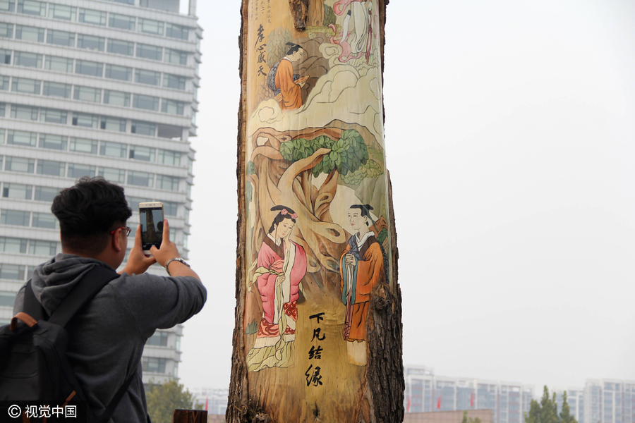 Colorful tree bark painting tells ancient legend