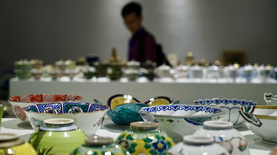 Visitors view ceramic craftworks in China Jingdezhen Int'l Ceramic Fair