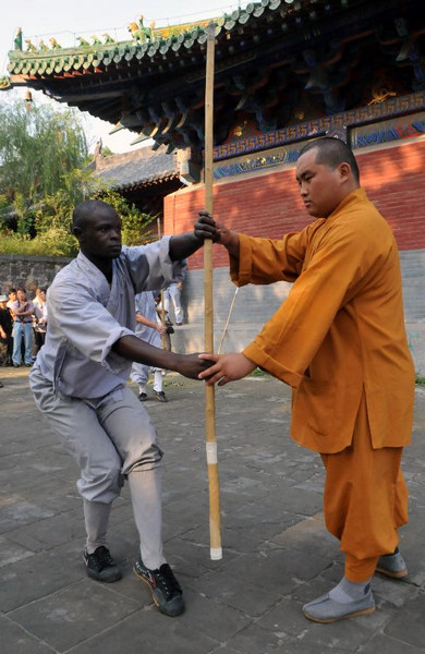 African apprentices practise kungfu at Shaolin Temple