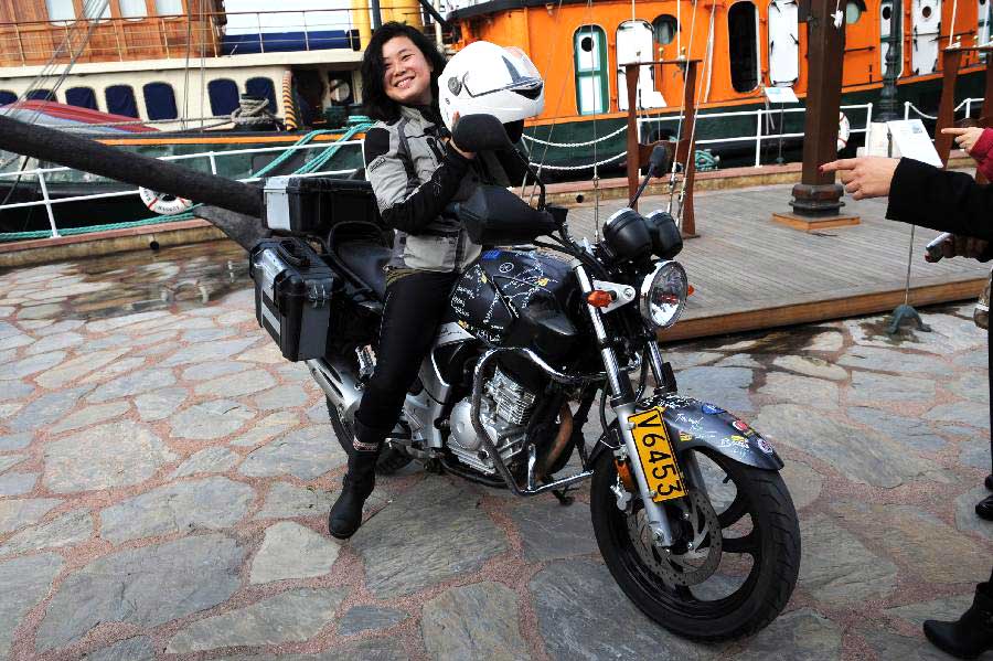 Chinese girl travels across Eurasia by motorcycle