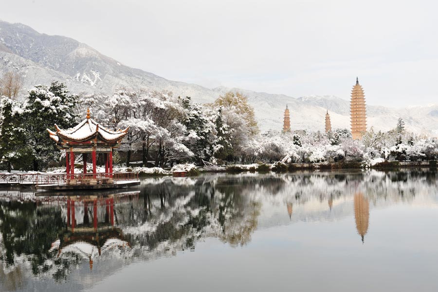 Yunnan cities hit with snow