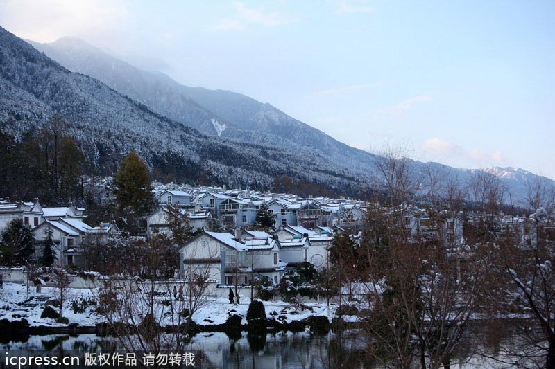 Yunnan cities hit with snow