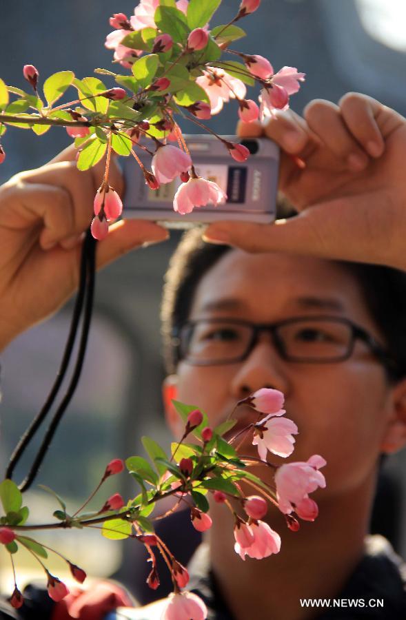 People embrace spring in Chinese cities