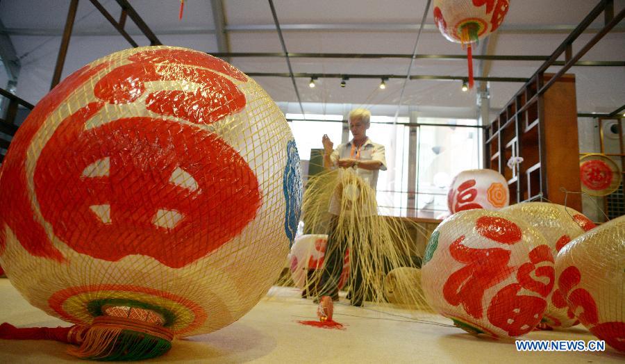 Chinese craftsmen show lanterns for Singapore's Teochew Festival