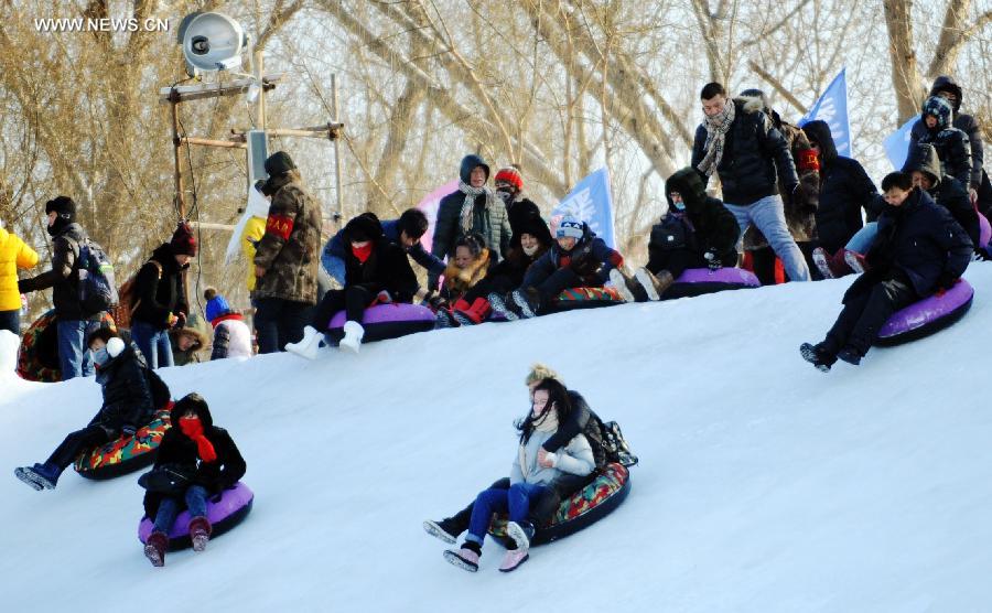 People celebrate New Year on frozen river