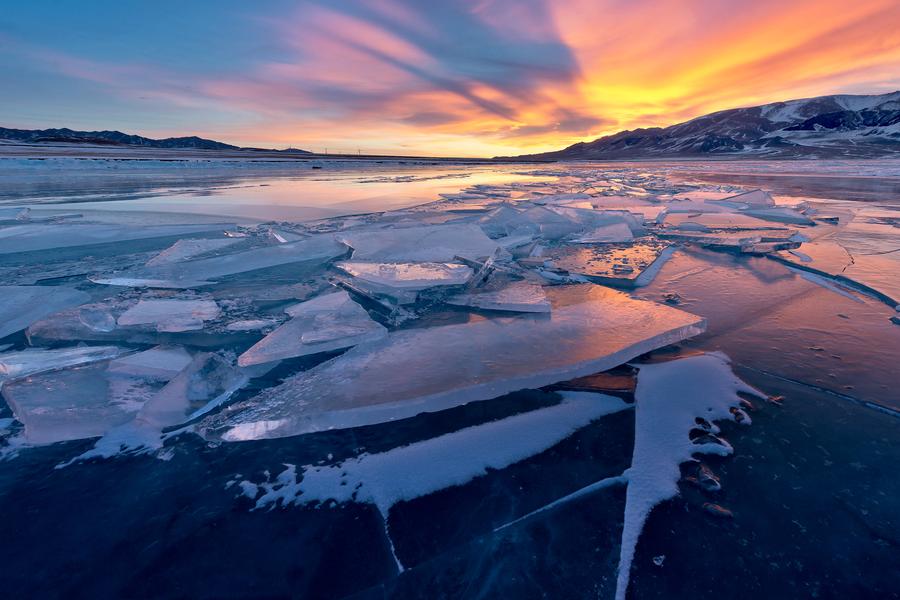 Stunning scenery of the icy Sayram Lake