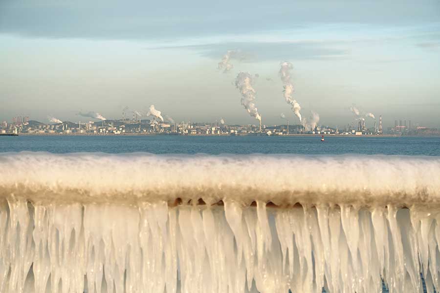 Icicles seen after snowfall on seashore in Dalian