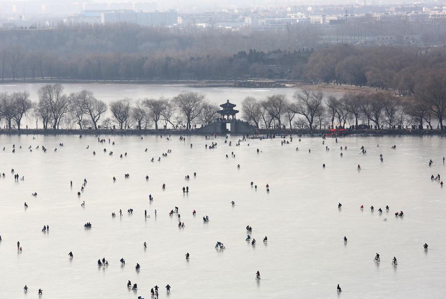 People skate on frozen Kunming Lake of Summer Palace