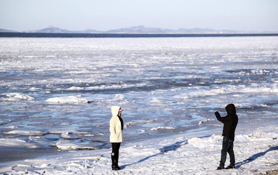 Scenery of frozen sea at Xiajiahezi bathing beach in Dalian