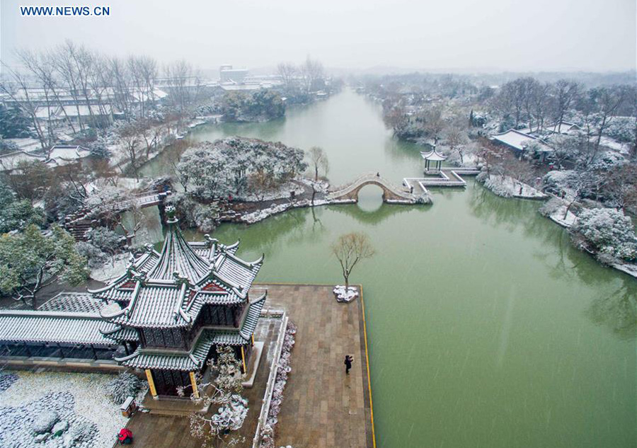 Scenery of Slender West Lake after snowfall in China's Yangzhou