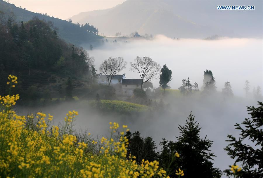 Clouds shroud ancient village Shitan, Anhui