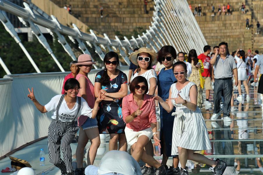 World's longest, highest glass bridge opens in Hunan