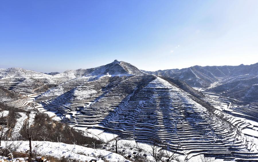 Scenery of terraced fields after snow in Hebei