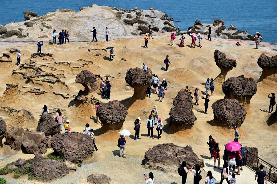 Tourists enjoy scenery of Yehliu Geopark in Taiwan