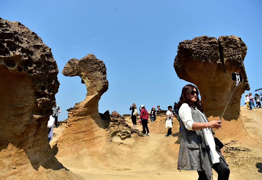 Tourists enjoy scenery of Yehliu Geopark in Taiwan