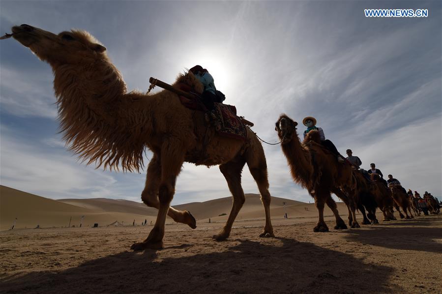 Mingsha Sand Mountain scenery zone in Dunhuang attracts tourists